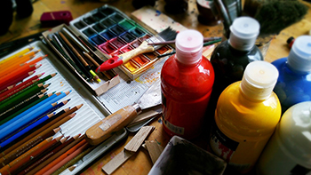 A variety of art supplies, including paint.